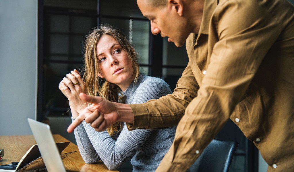 two people collaborating at work