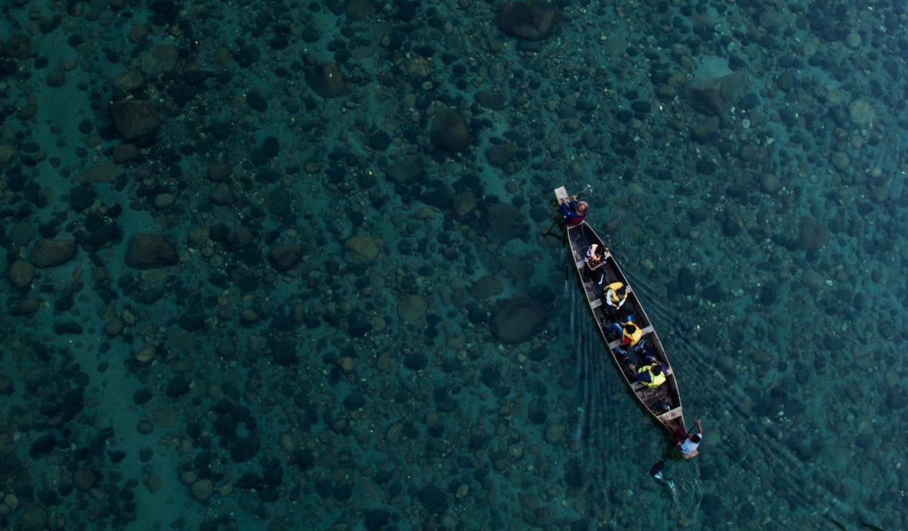 aerial photo of a boat in water