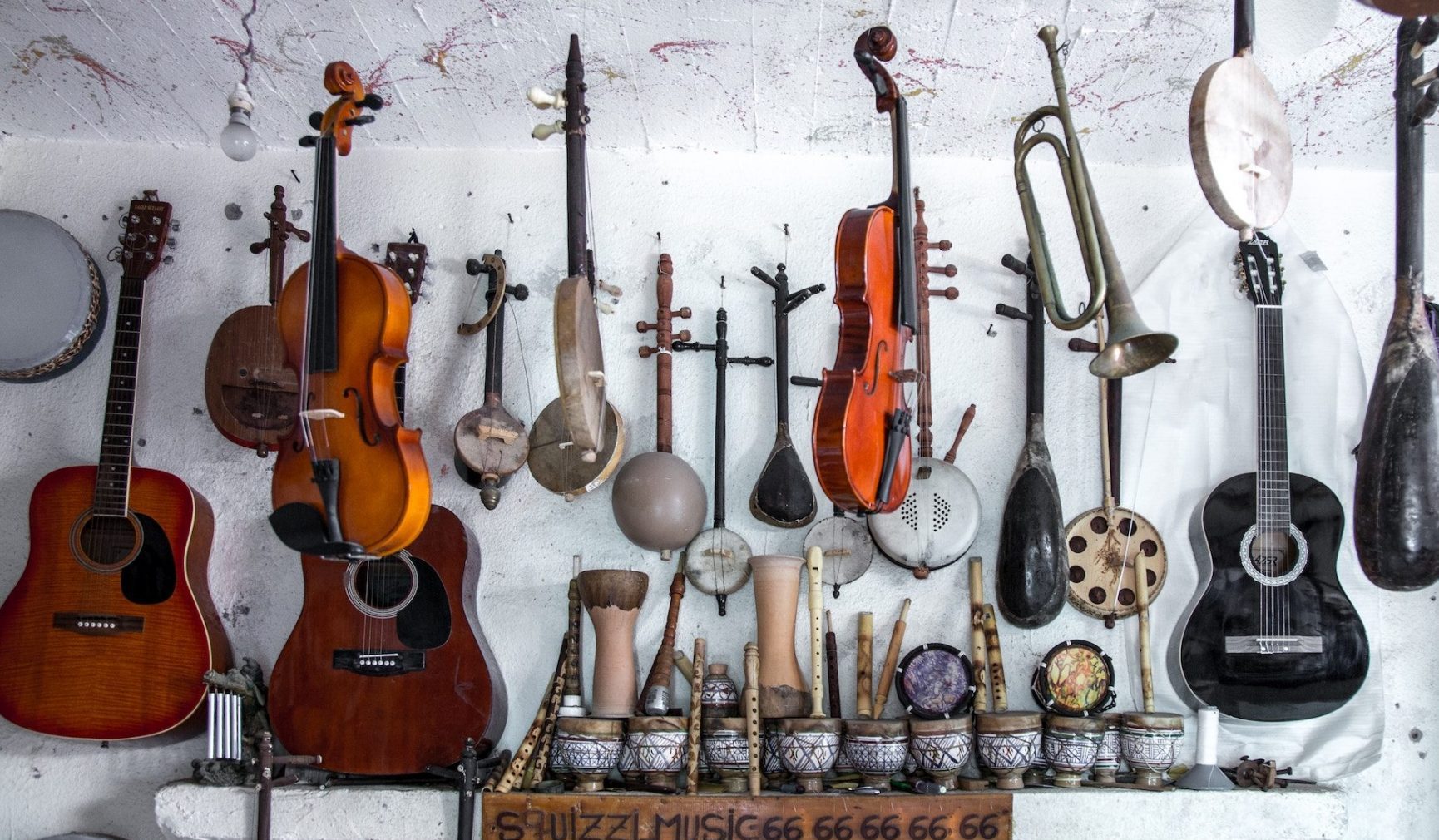 musical instruments hanging on wall