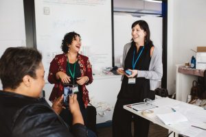 two people speaking at the NeuroLeadership Institute SUMMIT