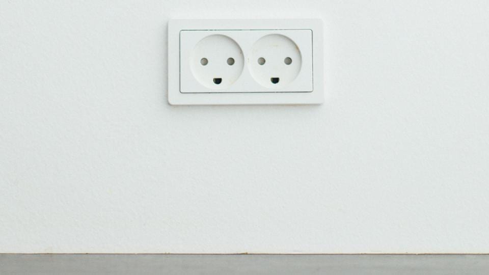 2 outlets against a while wall