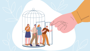 A hand opens a cage door for people who were trapped inside