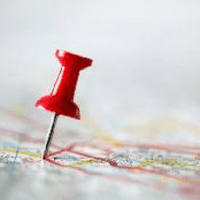 A push pin in a map